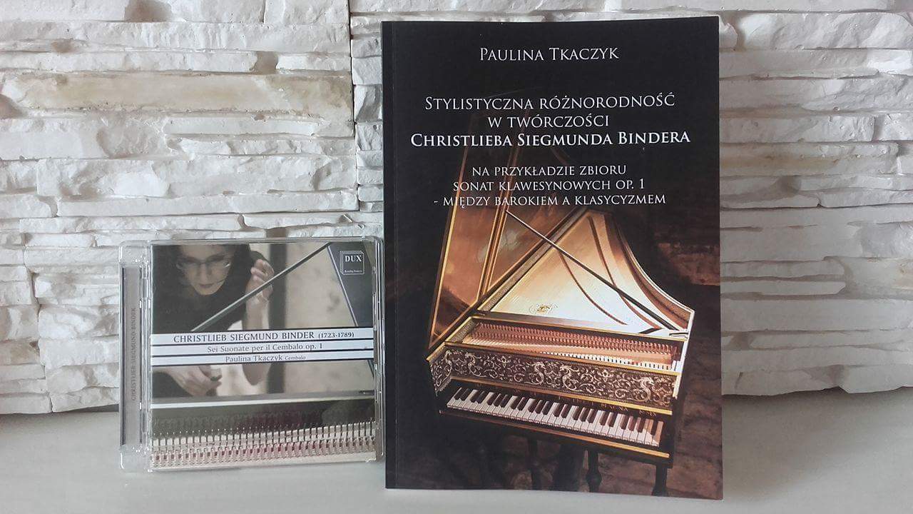 AI generated: The image shows a book and a CD, both of which deal with the music of Christlieb Siegmund Binder. The book deals with the stylistic diversity of Binder's work, while the CD contains his sonatas for harpsichord.